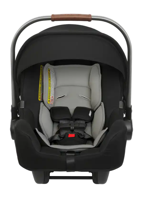 Nuna PIPA Infant Car Seat in Caviar - straight-on front view with canopy