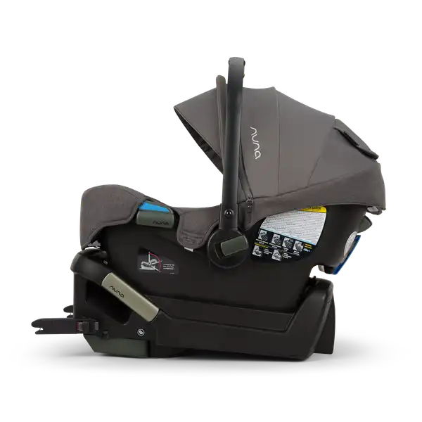 Nuna PIPA Infant Car Seat in Pewter - side view installed on the True lock base