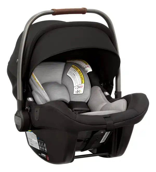 Nuna PIPA lite Infant Car Seat in Caviar - front three-quarter view with canopy