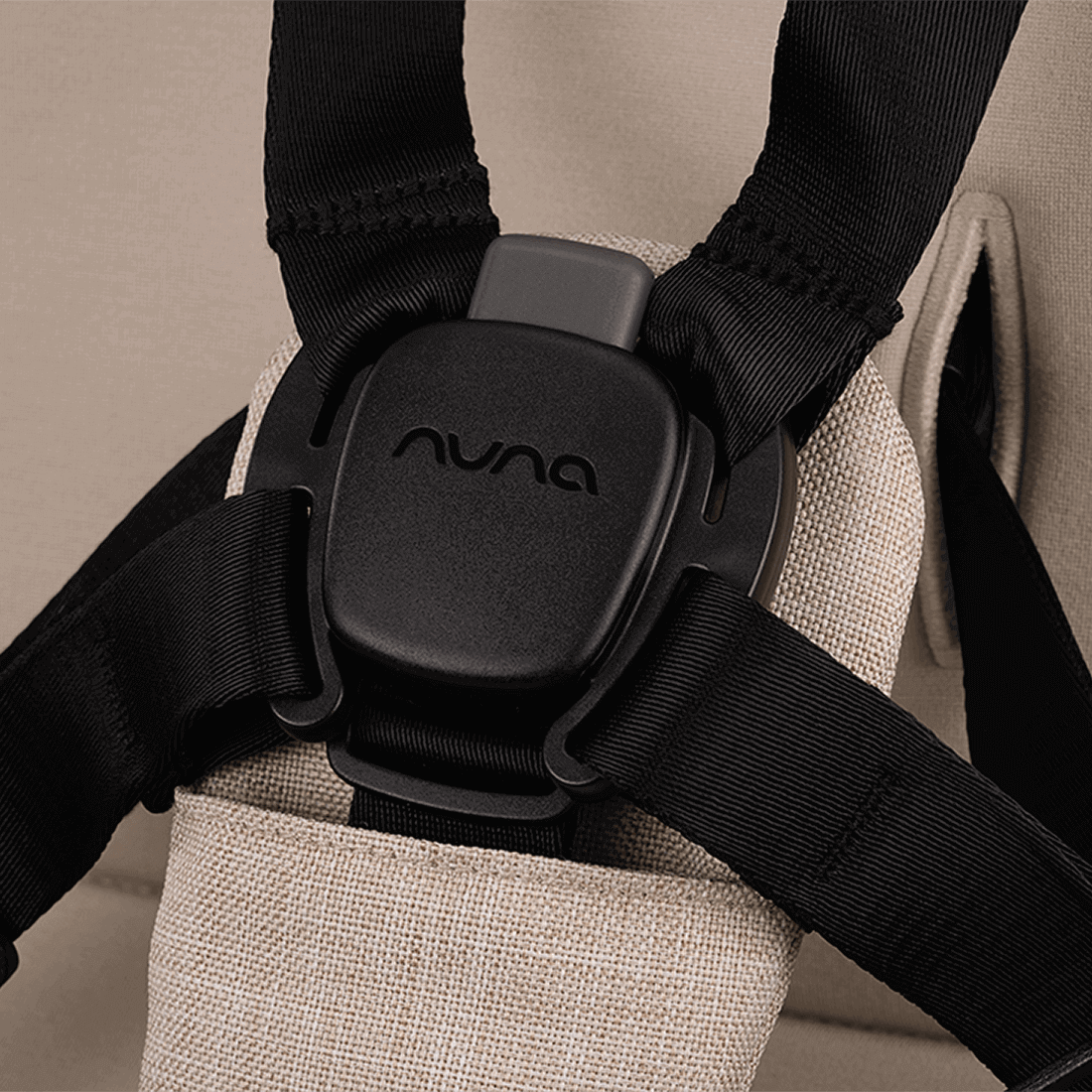 Nuna TRIV next Stroller — Biscotti MagneTech buckle close-up