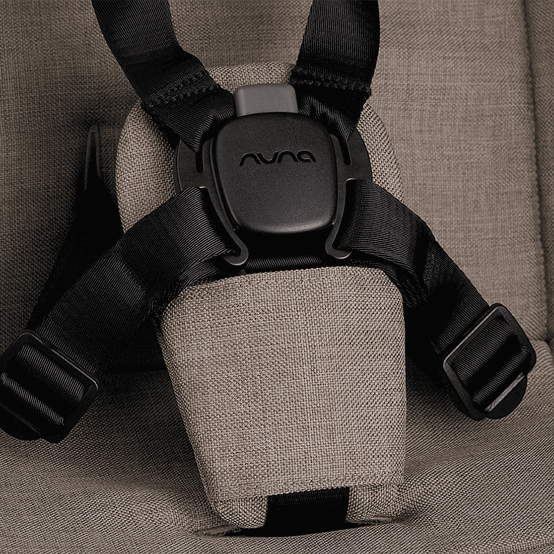 Nuna TRVL dubl Stroller — Cedar MagneTech buckle close-up