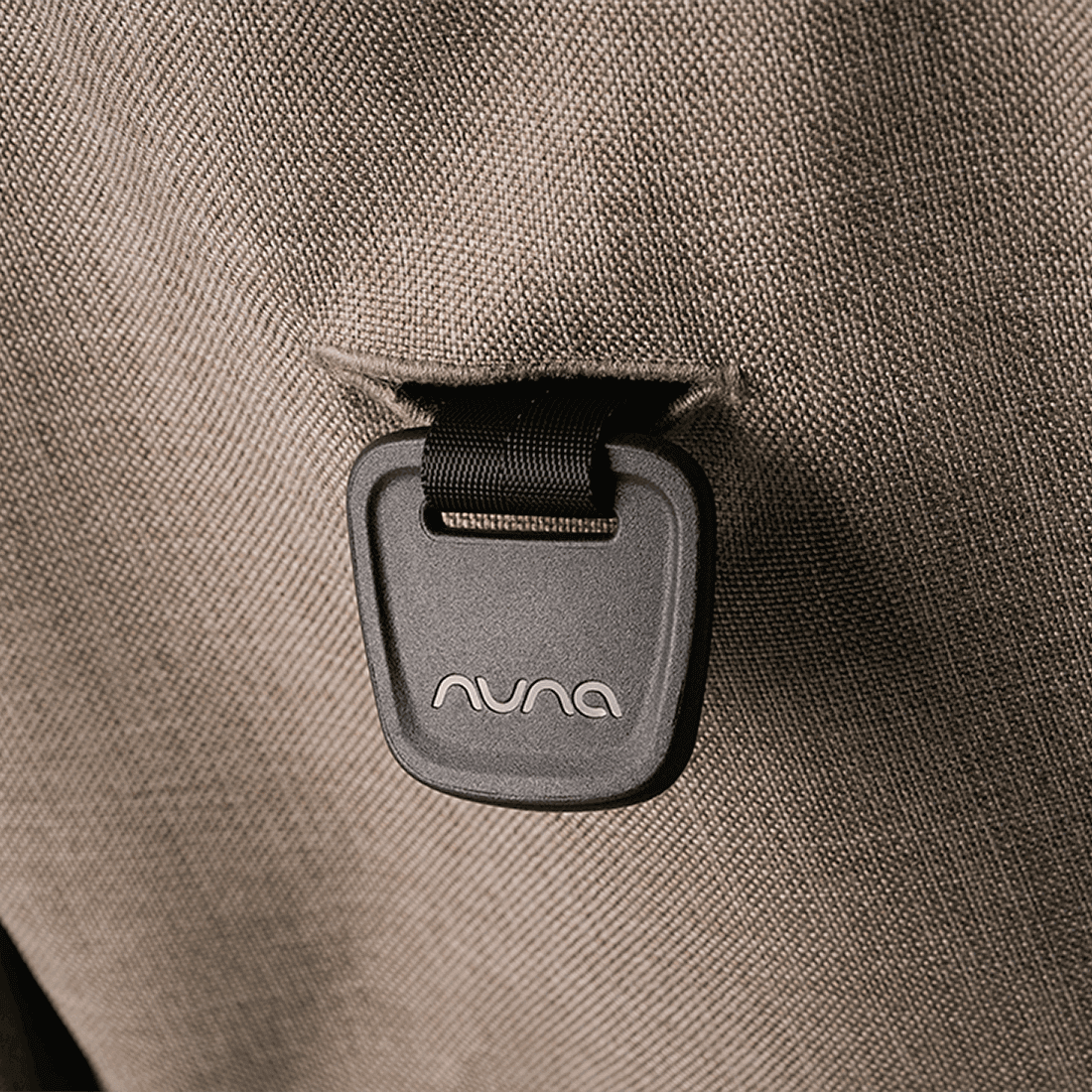 Nuna TRVL dubl Stroller — Cedar recline adjustment tab