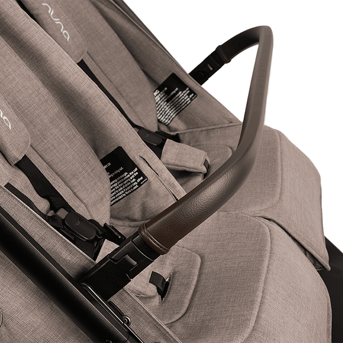Nuna TRVL dubl Stroller — Cedar shared armbar across both seats