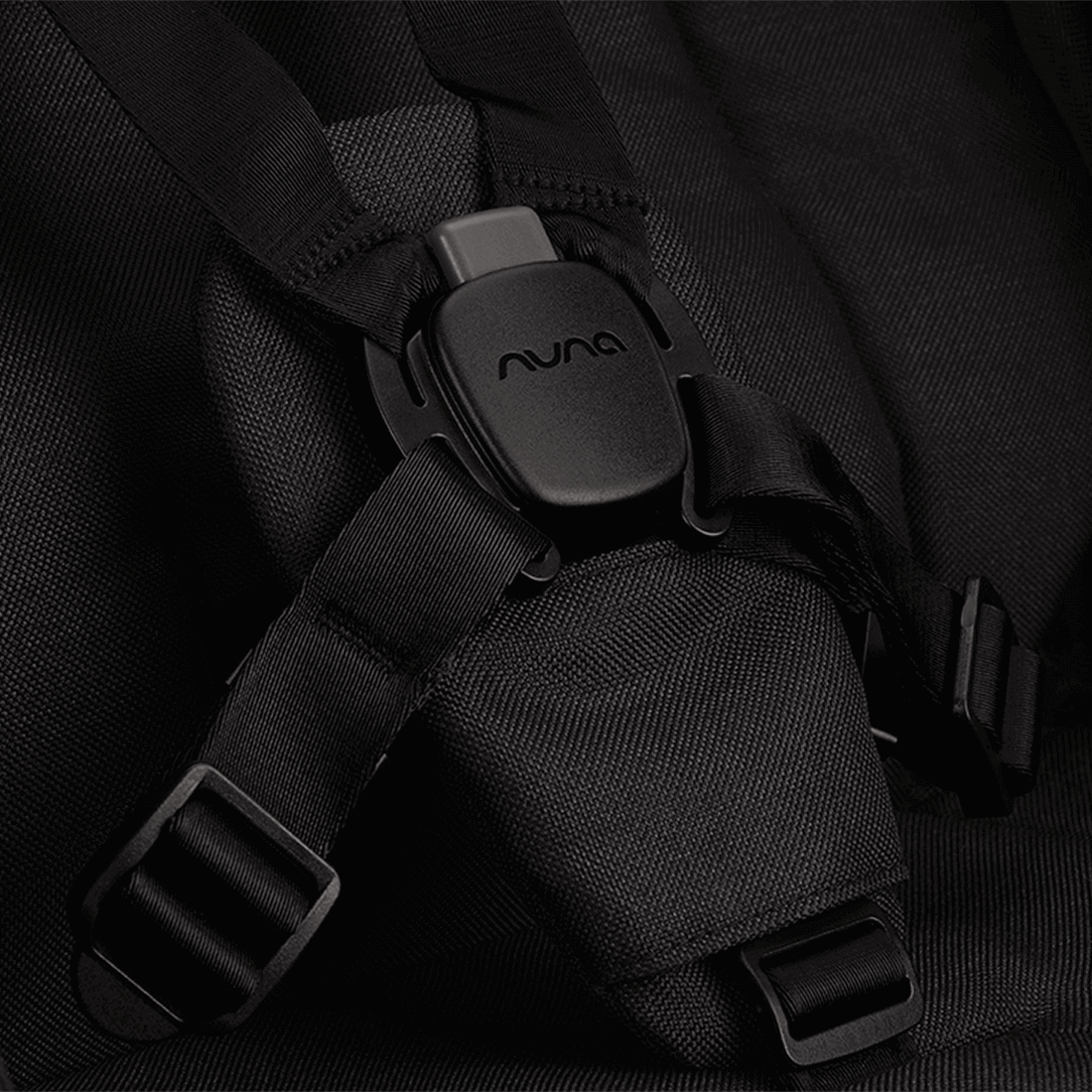Nuna TRVL lx Stroller — Caviar MagneTech buckle close-up