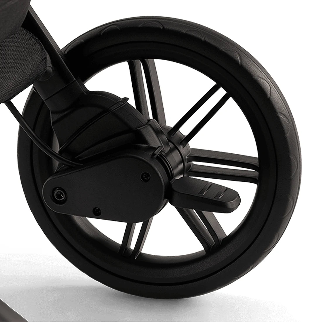 Nuna TRVL LX Stroller + PIPA Urbn Infant Car Seat Travel System showing Nuna TRVL lx Stroller — Caviar rear-wheel brake close-up