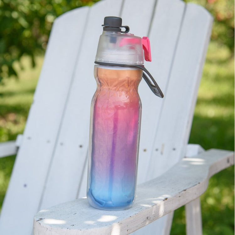 O2Cool 20 oz Mist 'N Sip 2-in-1 Misting Water Bottle - Ombre Raspberry lifestyle view
