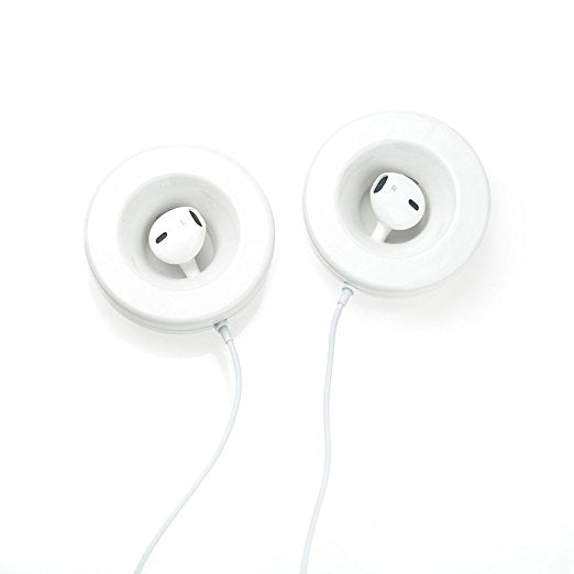 Olababy Bellytunes Prenatal Earbud Adapter System; two white in-ear earbuds nestled in circular holder bases with cords.