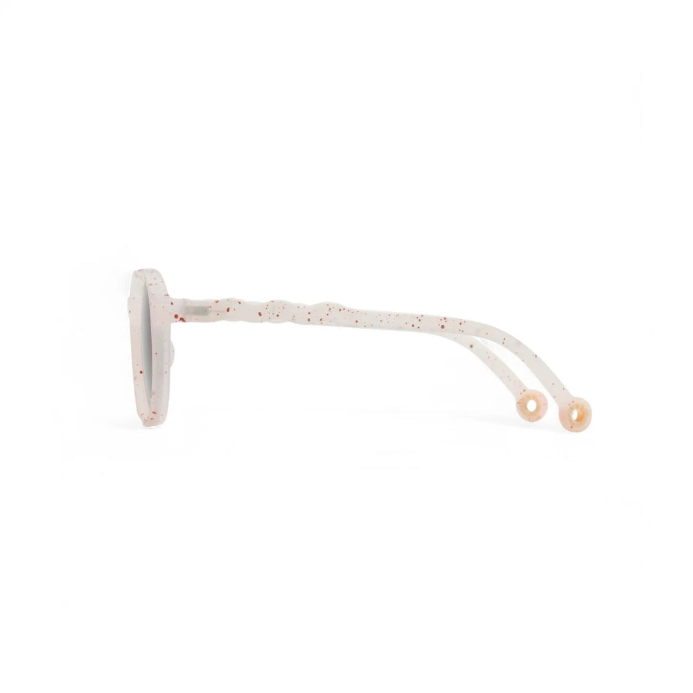 Olivio & Co Oval Sunglasses Kids Gelato Summer Vanilla Brownie cream speckled frame with beige temples, side view