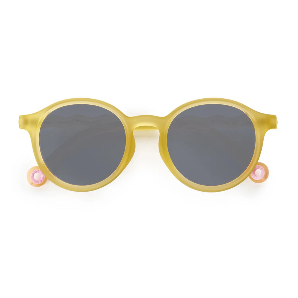 Olivio & Co Oval Sunglasses Junior+ Classic Olivio Sun Coral, yellow translucent frame with gray lenses and pink temple accents