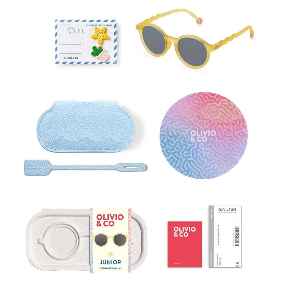 Olivio & Co Oval Sunglasses Junior+ Classic Olivio Sun Coral with yellow frame, shown with case, cloth, pouch, and card