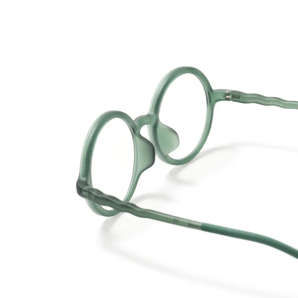OLIVIO & CO Round Screen Glasses for Kids in seaweed green, with round frames resting on a white surface.