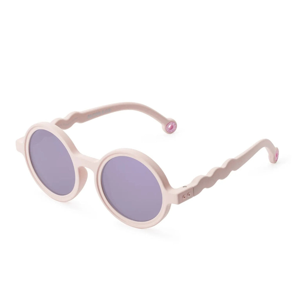 OLIVIO & CO Round Sunglasses Kids Coral Blush with purple lenses and wavy pink temples.