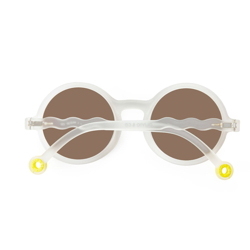 Olivio & Co Round Sunglasses for Kids Citrus Garden with white frame and brown lenses, yellow-tipped arms visible.