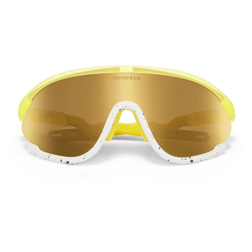 Olivio & Co Sport Sunglasses Junior+ Daisy Soda, yellow frame with speckled white trim and amber lenses on display.