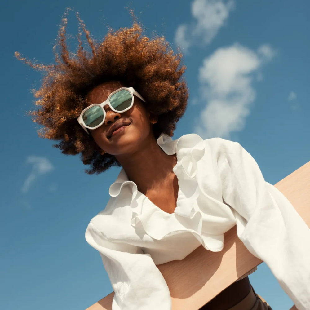 Olivio & Co Junior+ Creative Edition square sunglasses, cloud white frames with green lenses.