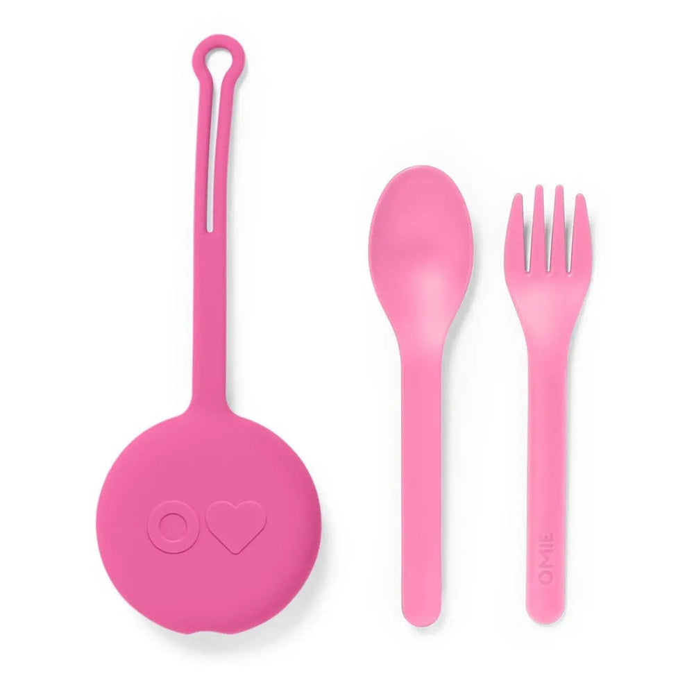 Omielife Fork Spoon Pod Set in pink silicone; round pod sits beside a spoon and fork, showing three-piece lunch kit.