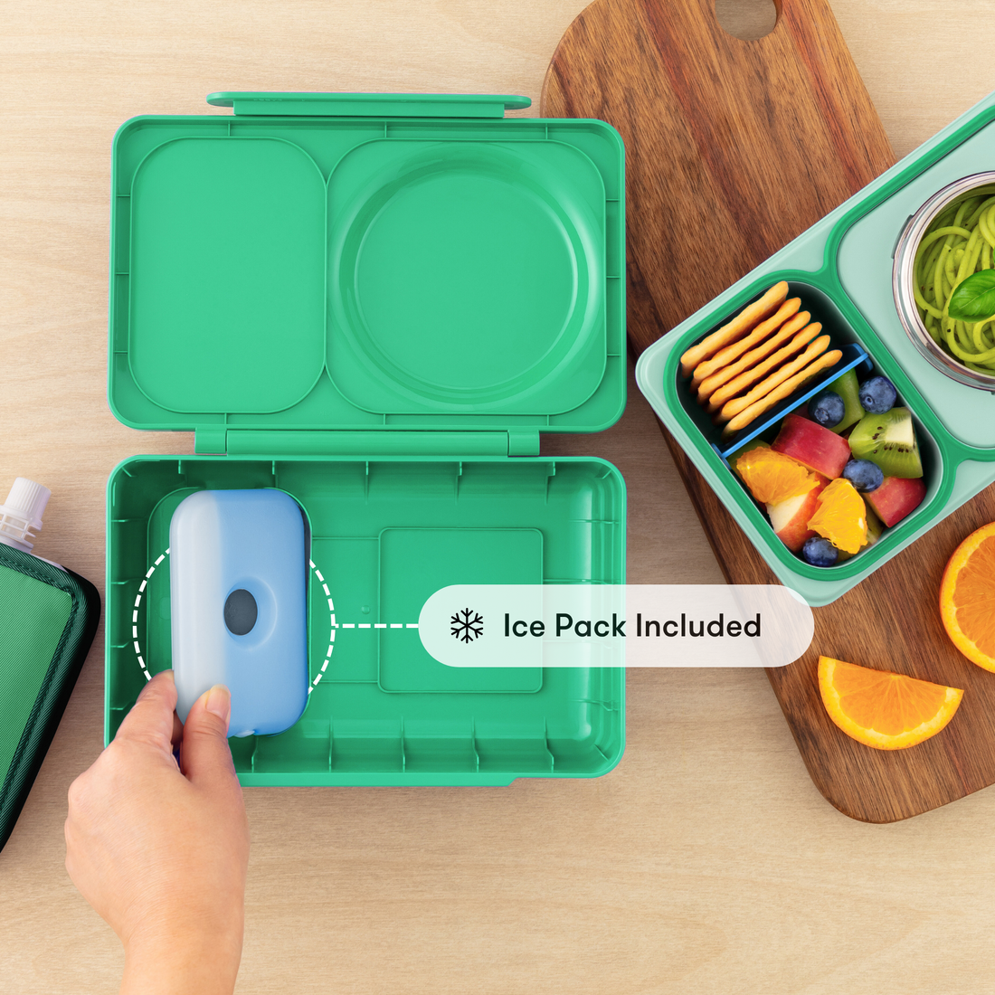 OmieBox UP Jade Green base showing the removable blue ice pack compartment