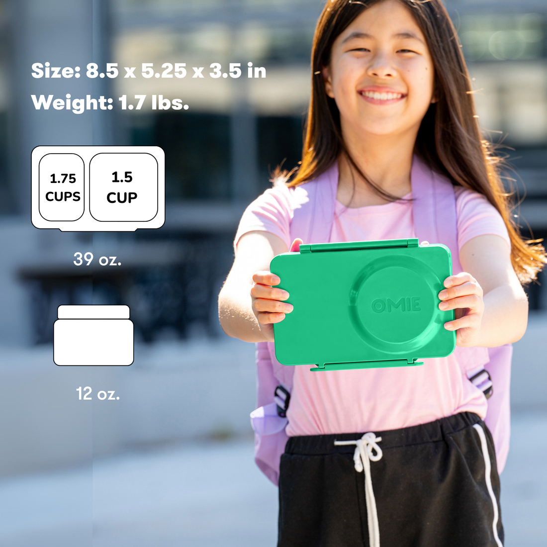 Older child holding a closed OmieBox UP Jade Green beside size, weight and capacity details