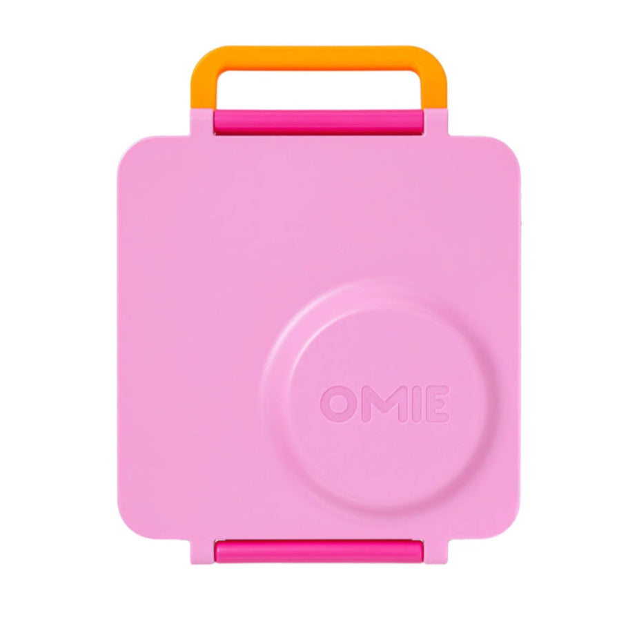 OmieBox Version 2 pink lunch box with orange carry handle, closed and ready to carry
