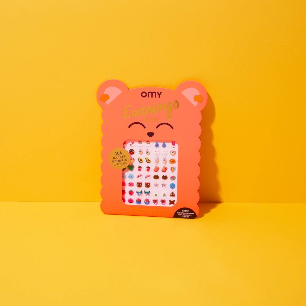 OMY Kids Sticker Earrings - Kawaii in pink bear packaging, window reveals 104 cute sticker earrings.