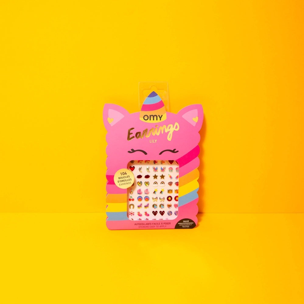 OMY Kids sticker earrings Unicorn, pink unicorn packaging with rainbow stripes, showing a sheet of 104 colorful earrings.