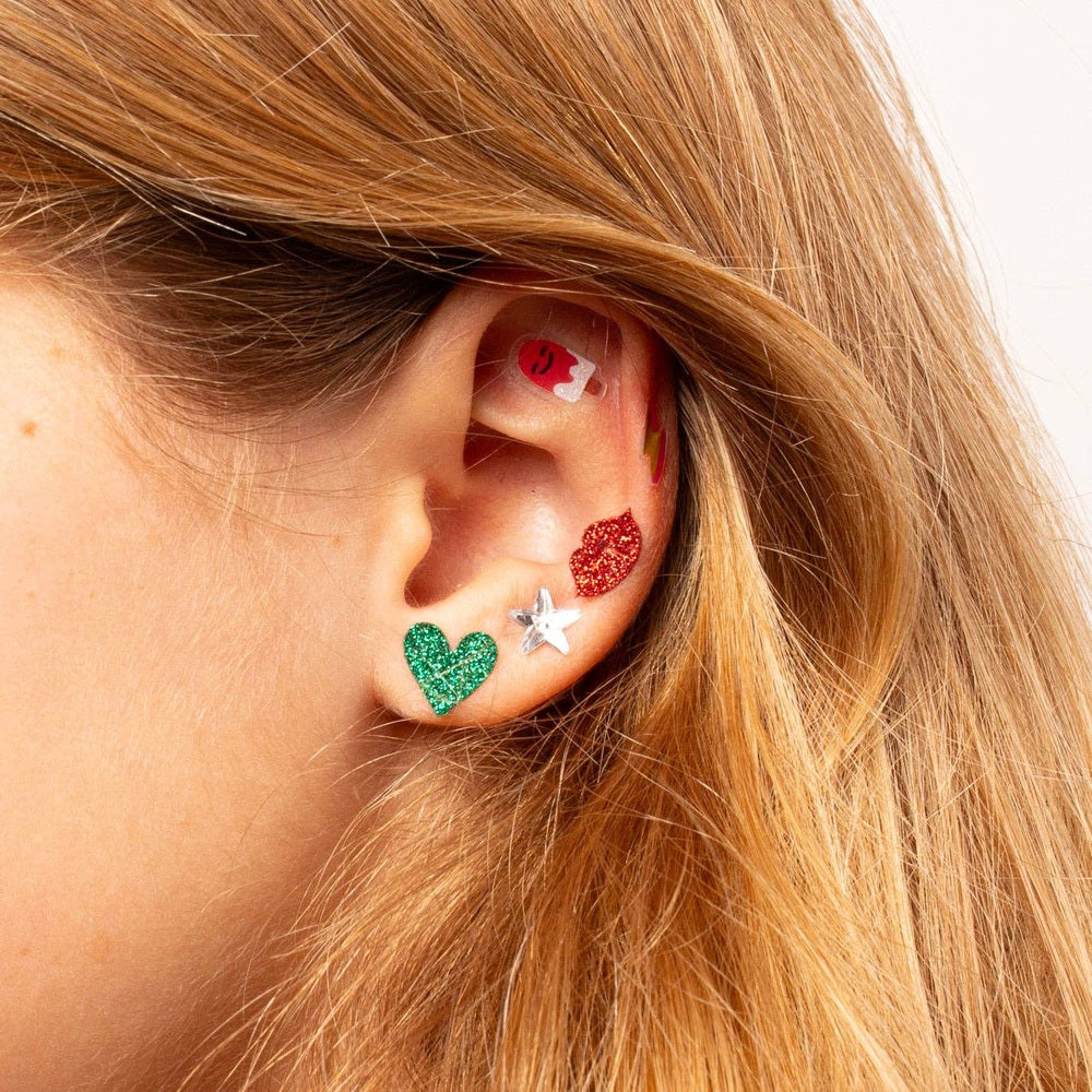 OMY - Kids sticker earrings Unicorn on ear with green glitter heart and silver star studs.