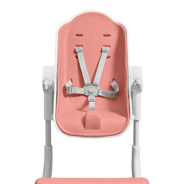 Oribel Cocoon Z high chair lounger in pink with white frame and 5-point safety harness
