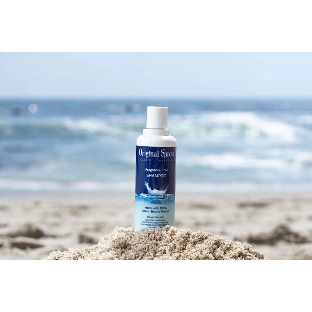 Original Sprout Coastal Collection Fragrance Free Shampoo 8 oz bottle on sandy beach with blue label