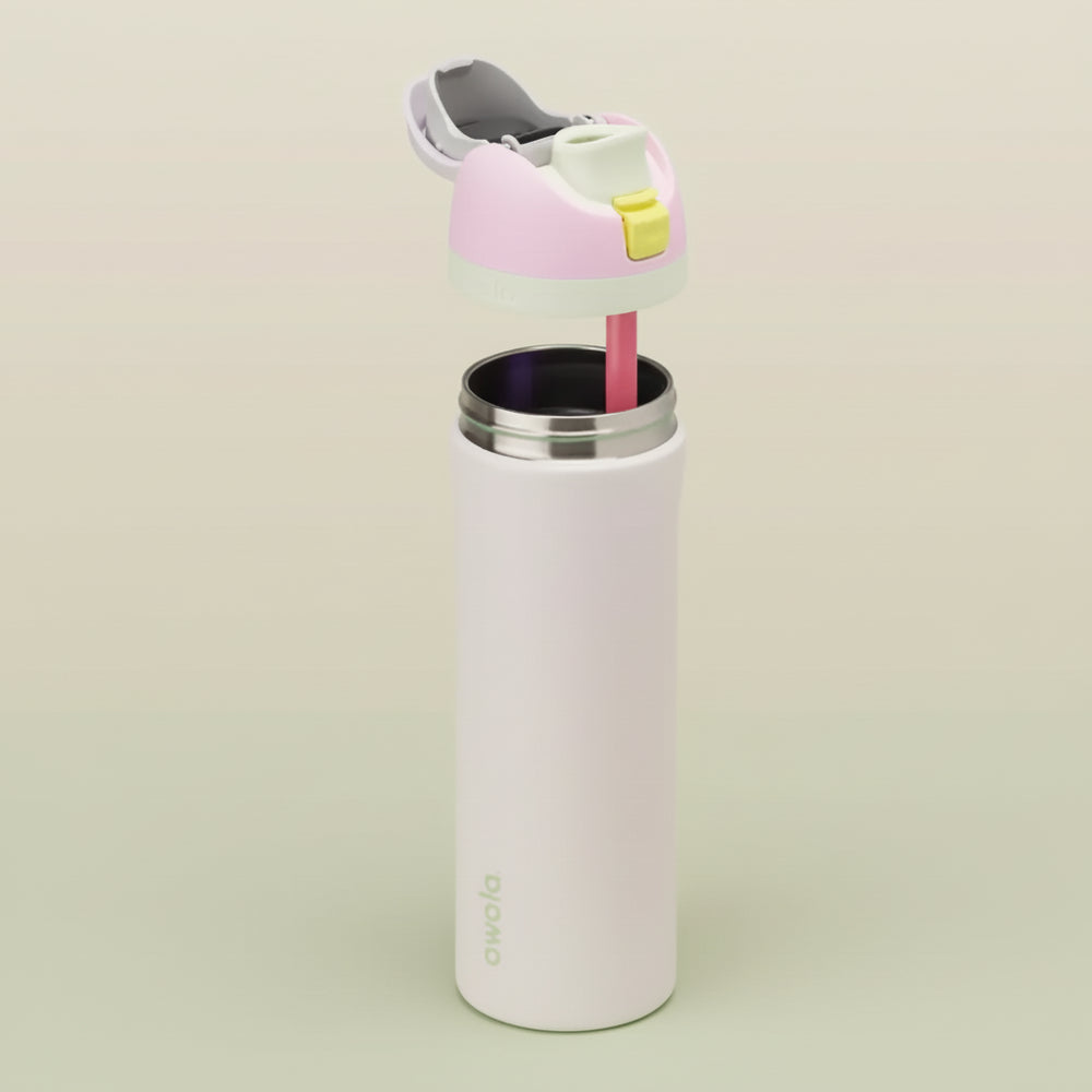 Owala FreeSip 24 oz Stainless Steel Water Bottle in Candy Coated — removable lid and straw above the open stainless steel bottle