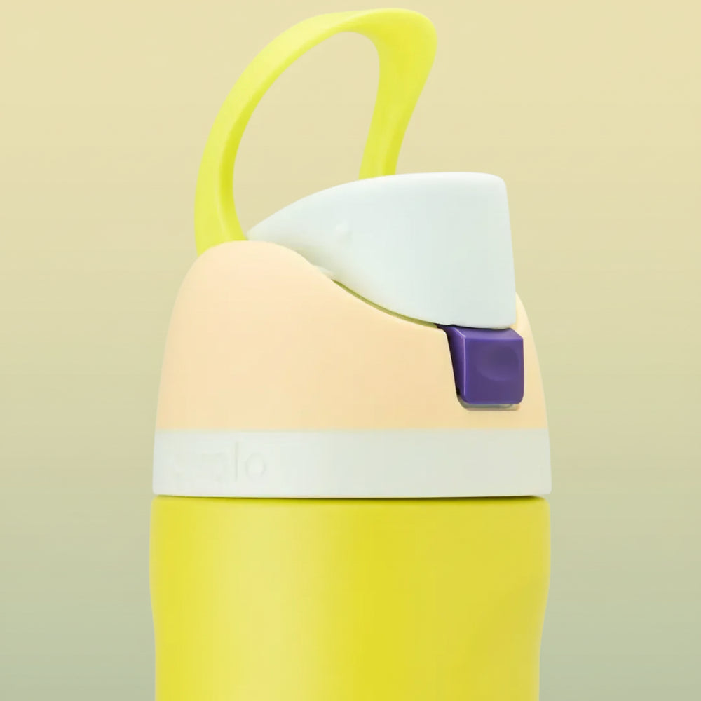 Owala FreeSip 24 oz Stainless Steel Water Bottle in Lemon Limeade — raised carry loop and closed spout cover