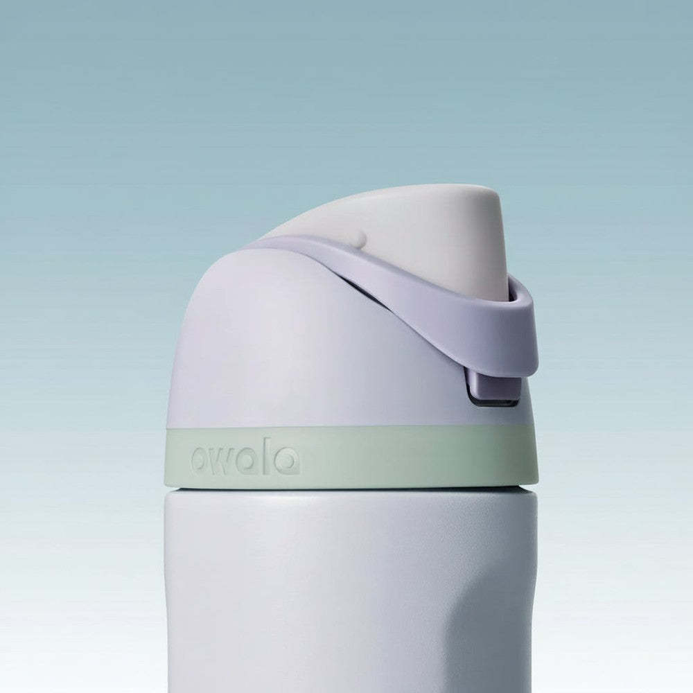 White water bottle with a purple cap and green base on a white background