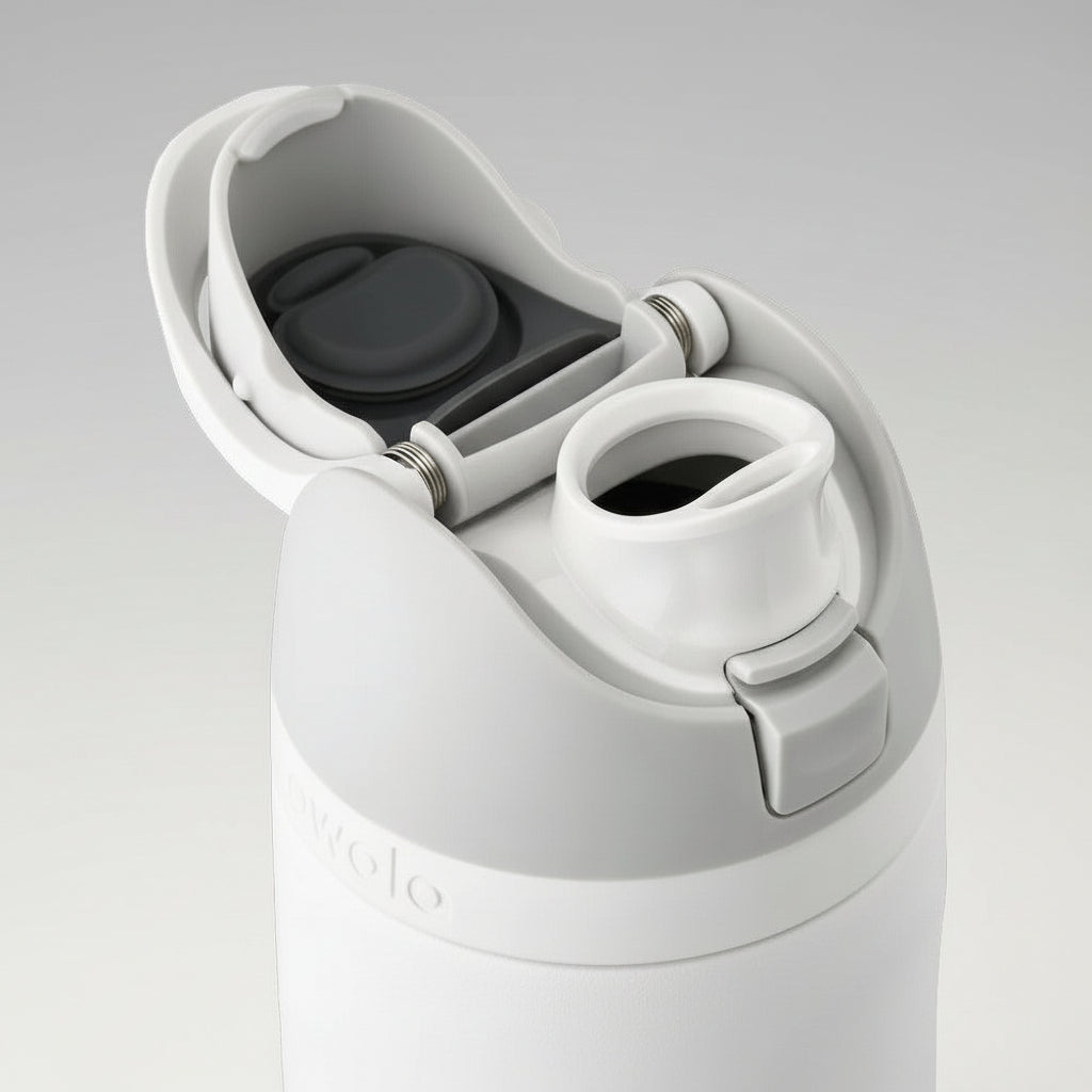Close-up of a white water bottle with a black lid on a white background