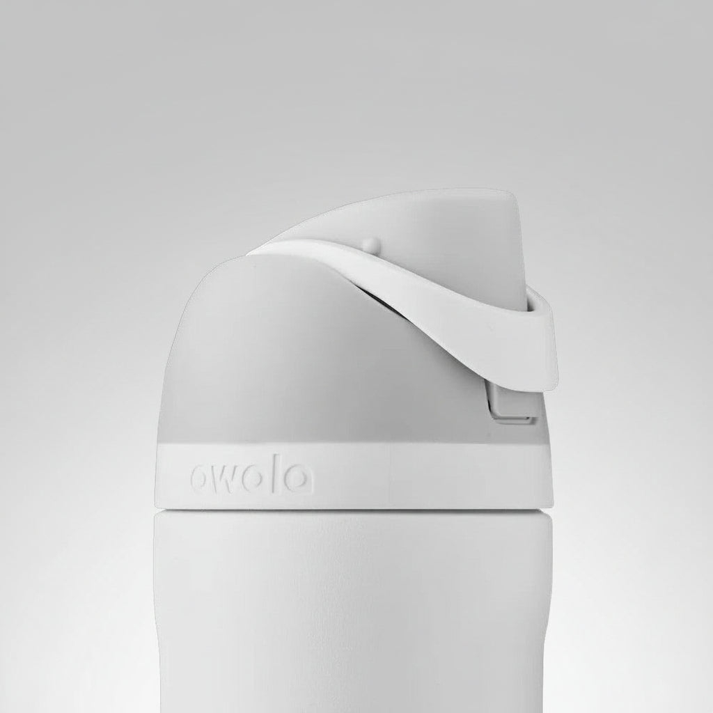Gray insulated mug with a white handle on a white background