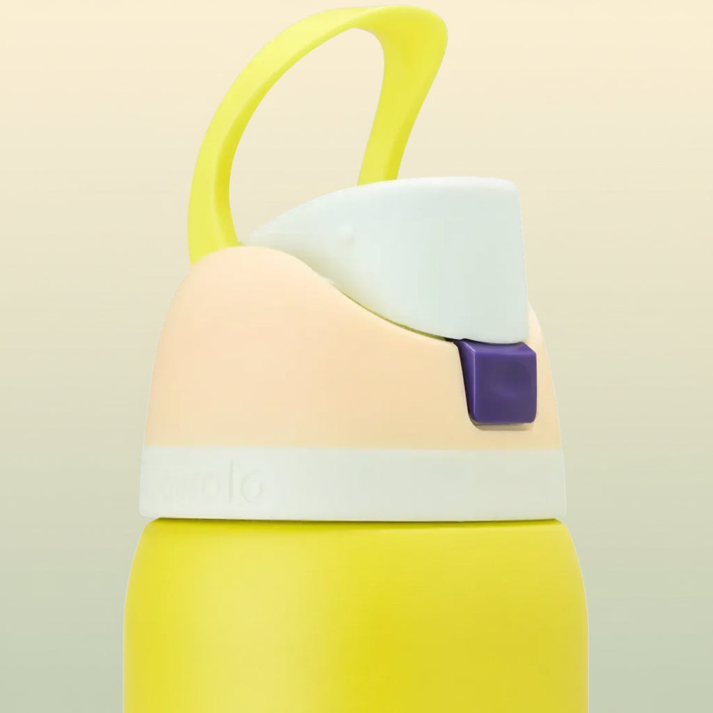 Owala FreeSip 32 oz Stainless Steel Water Bottle in Lemon Limeade — raised carry loop and closed spout cover