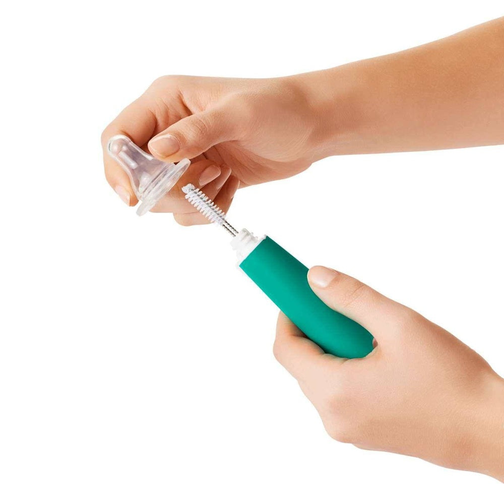 OXO Tot soap-dispensing bottle brush with teal handle and clear cap