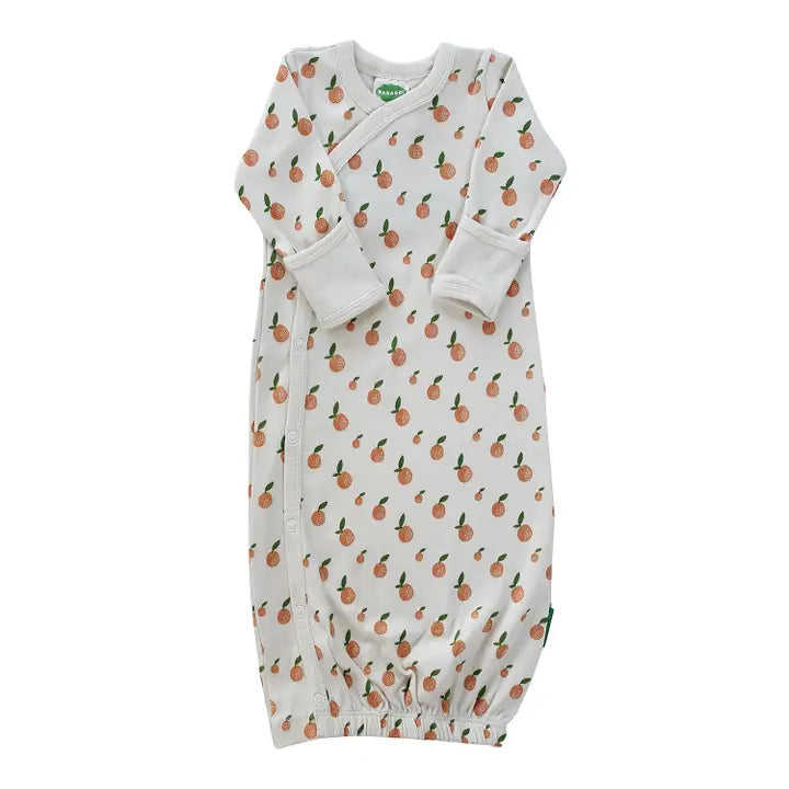 PARADE Parade Organic Gowns Signature Prints white baby gown with orange fruit print, wrap front and elastic hem.