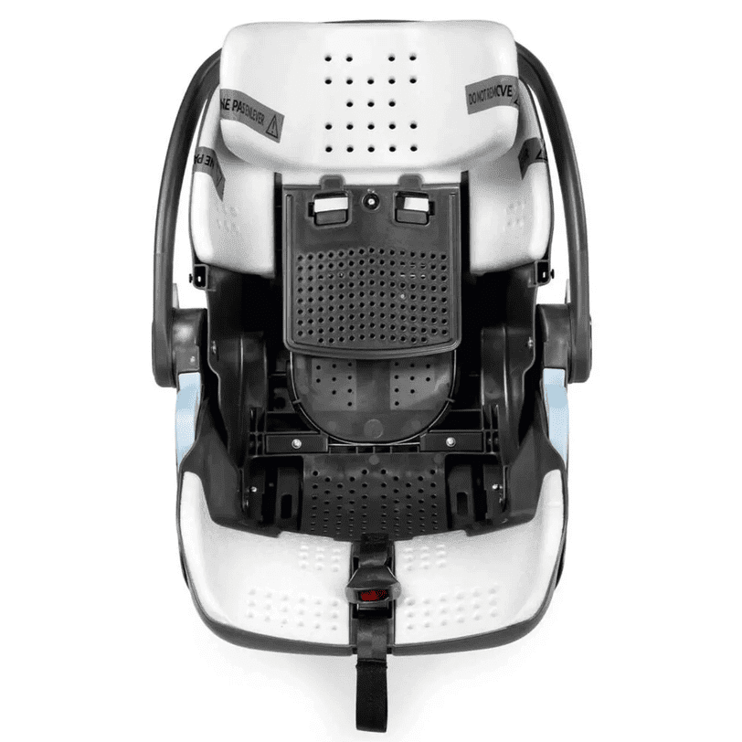 Peg Perego Primo Viaggio Lounge Infant Car Seat in white and black, with visible recline base and carrying handle.