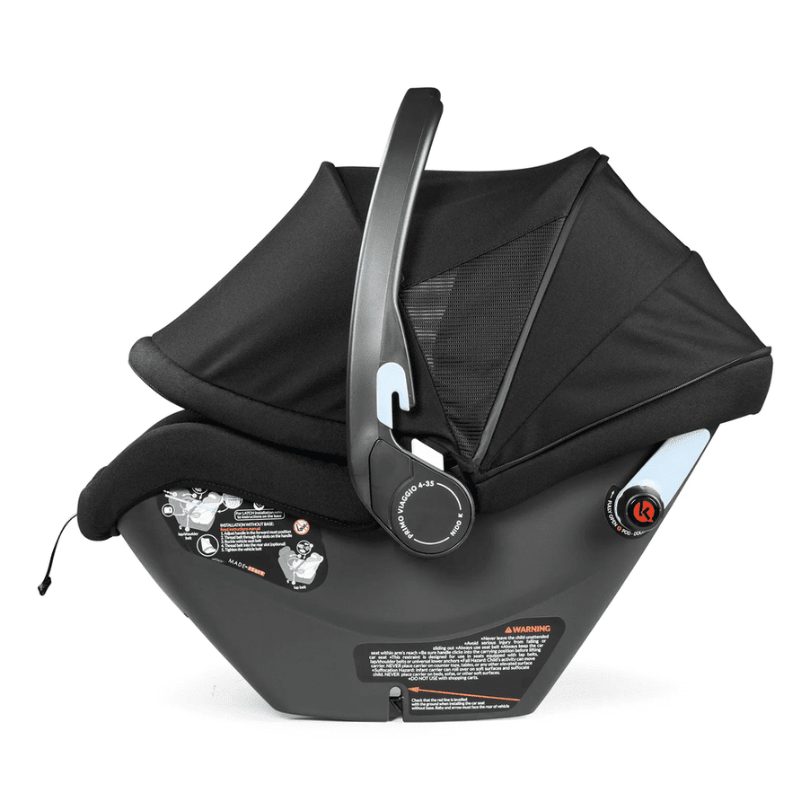 Peg Perego Primo Viaggio Nido infant car seat with black canopy, raised carrying handle, and base.