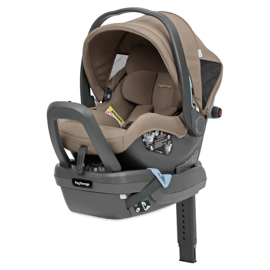 Peg Perego Primo Viaggio Nido infant car seat in beige with base, extended support leg, and carry handle