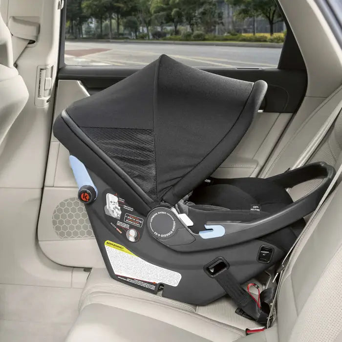 Peg Perego Primo Viaggio Urban Mobility infant car seat in black, canopy extended, rear-facing.
