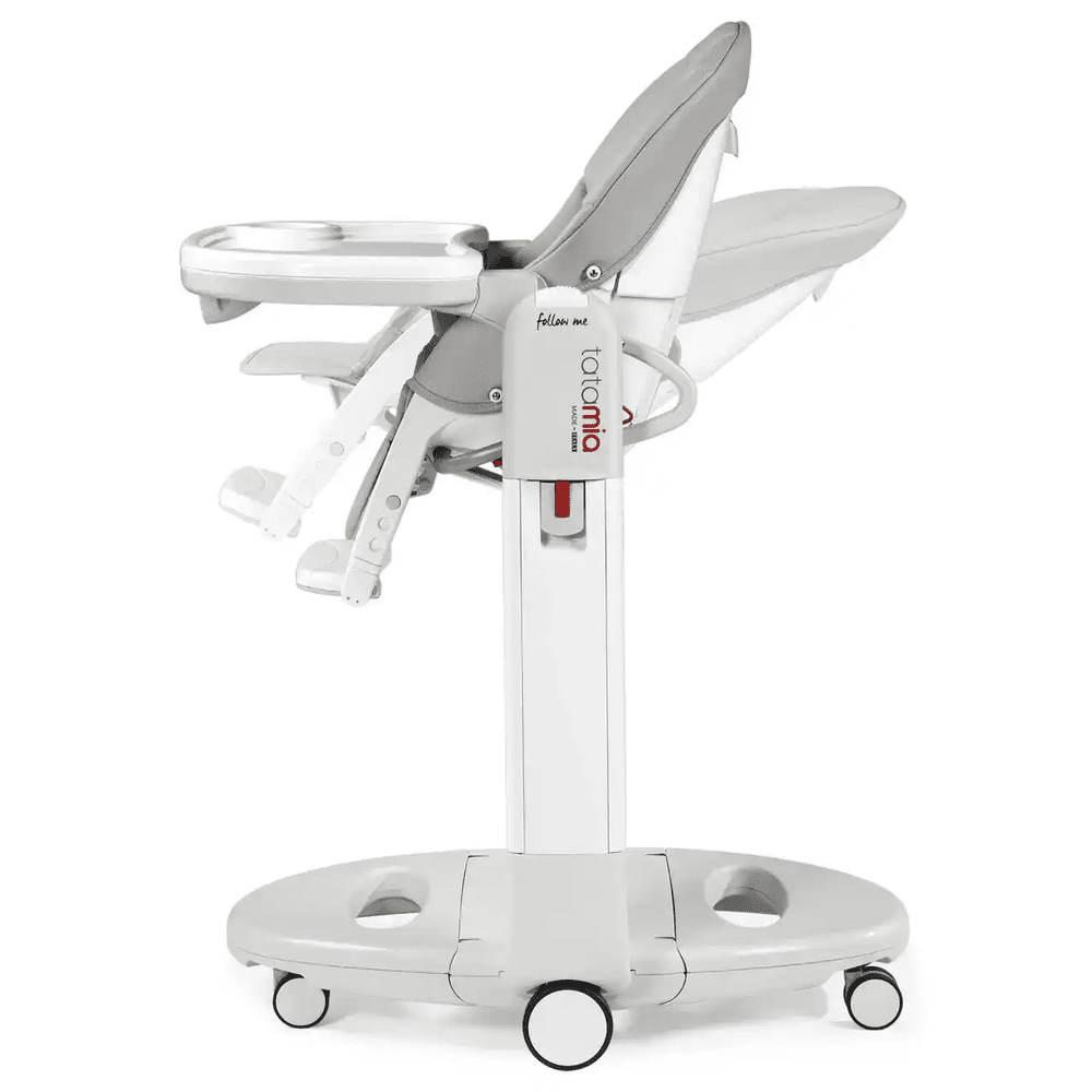 Peg Perego Tatamia High Chair in white with detachable tray and wheeled base for easy maneuvering.