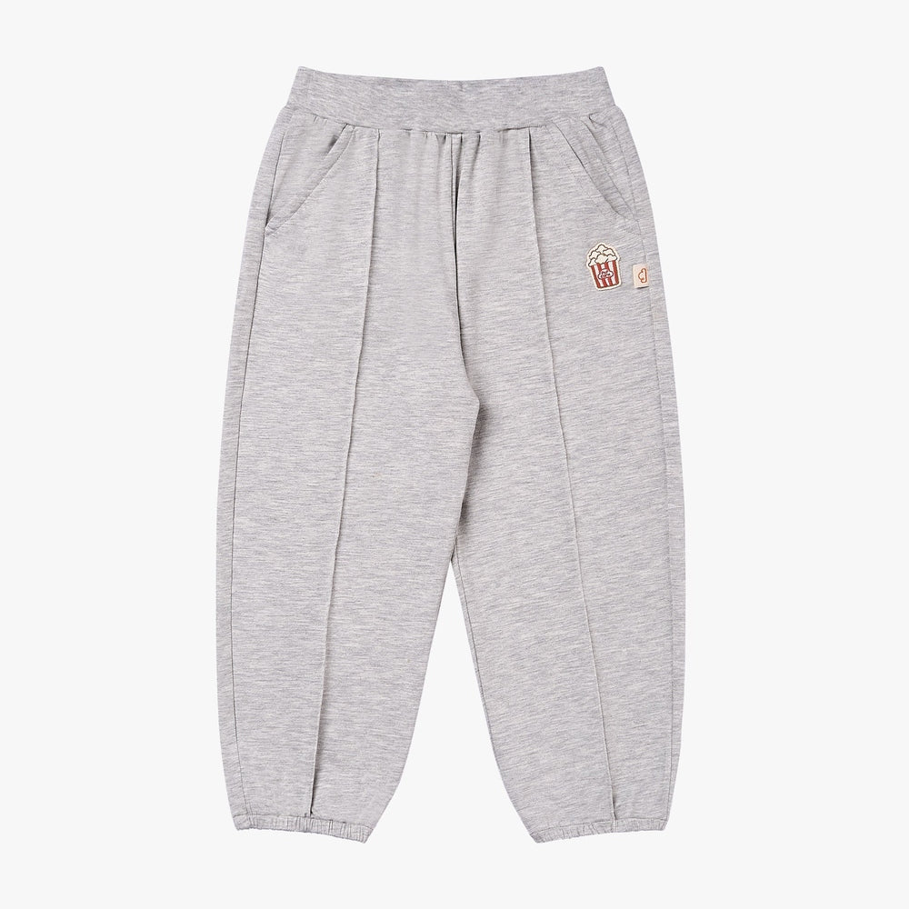 Gray sweatpants with a logo on a white background