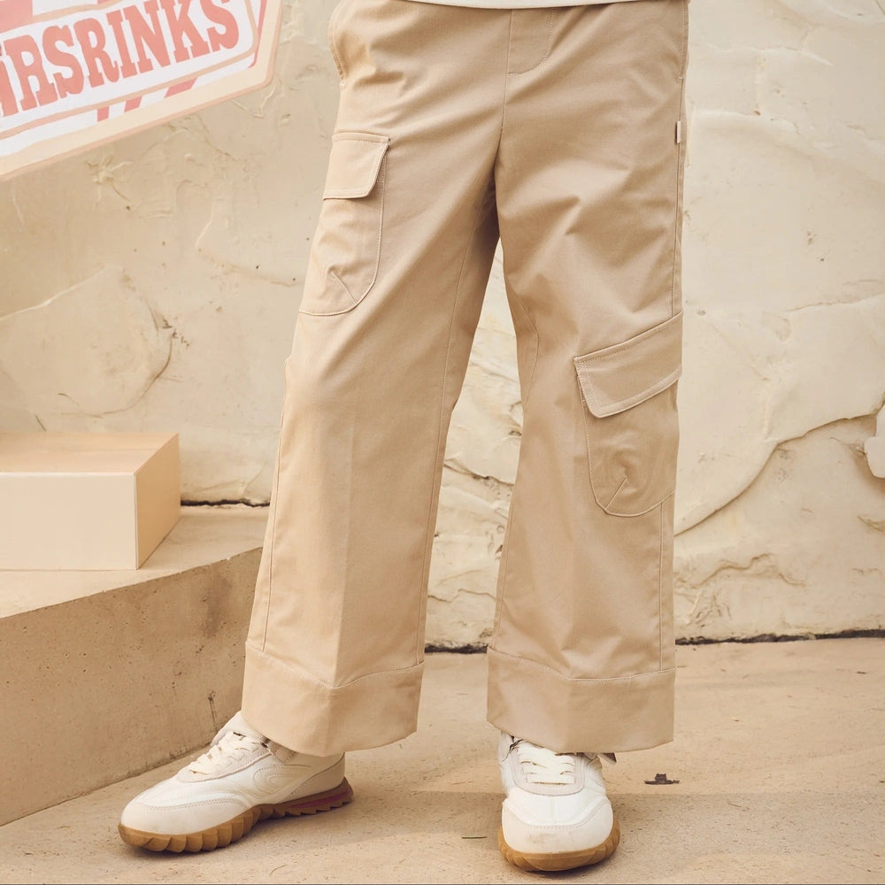 PETITE REVERY Petite Revery Cargo Pants - Sandy Neutral with flap-closure cargo pockets and wide rolled cuffs img 3/6
