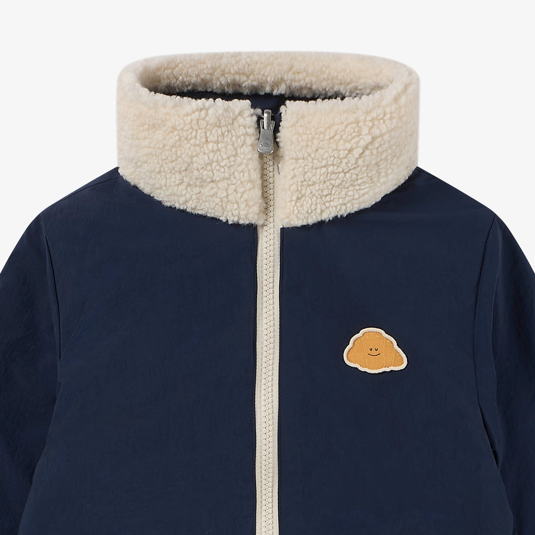 Petite Revery Cozy Crumbs Reversible Fleece Jacket in Blueberry, stand collar and zipper detail