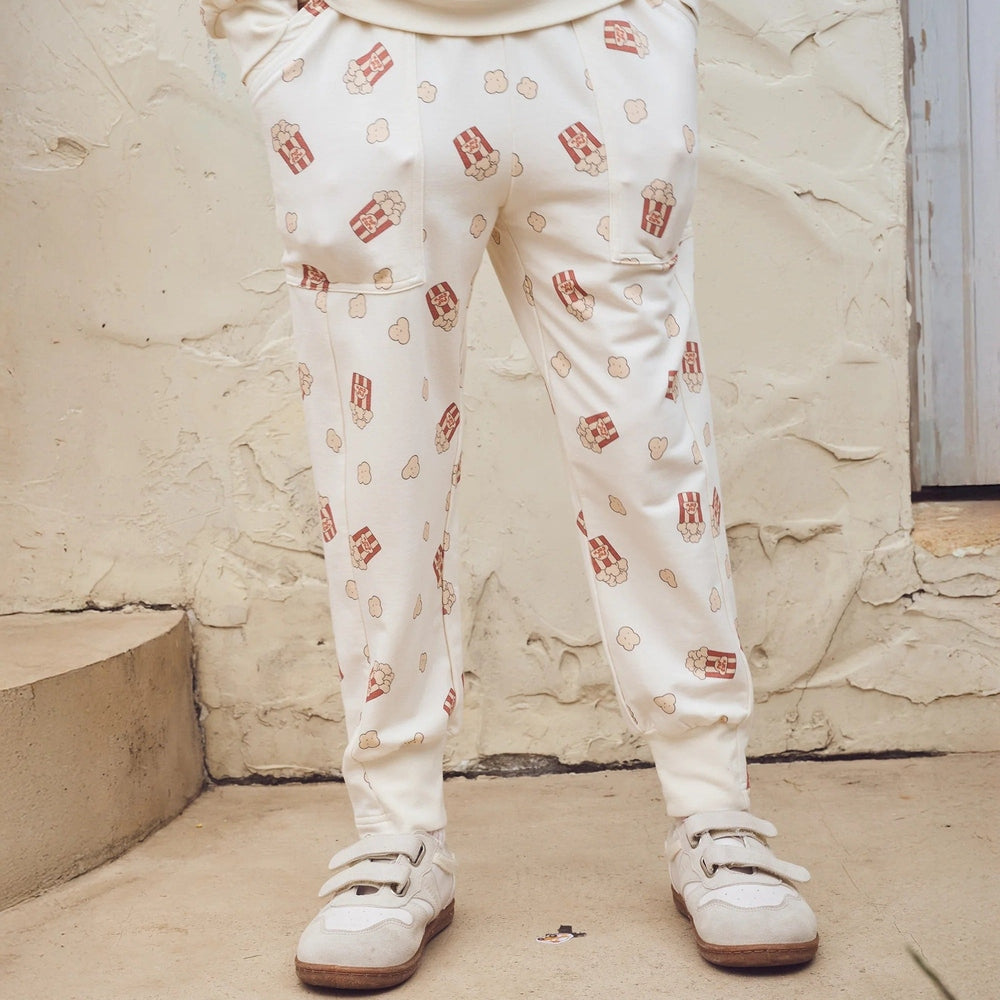 PETITE REVERY Petite Revery Joggers - Showtime all-over popcorn container and kernel print pattern img 3/6