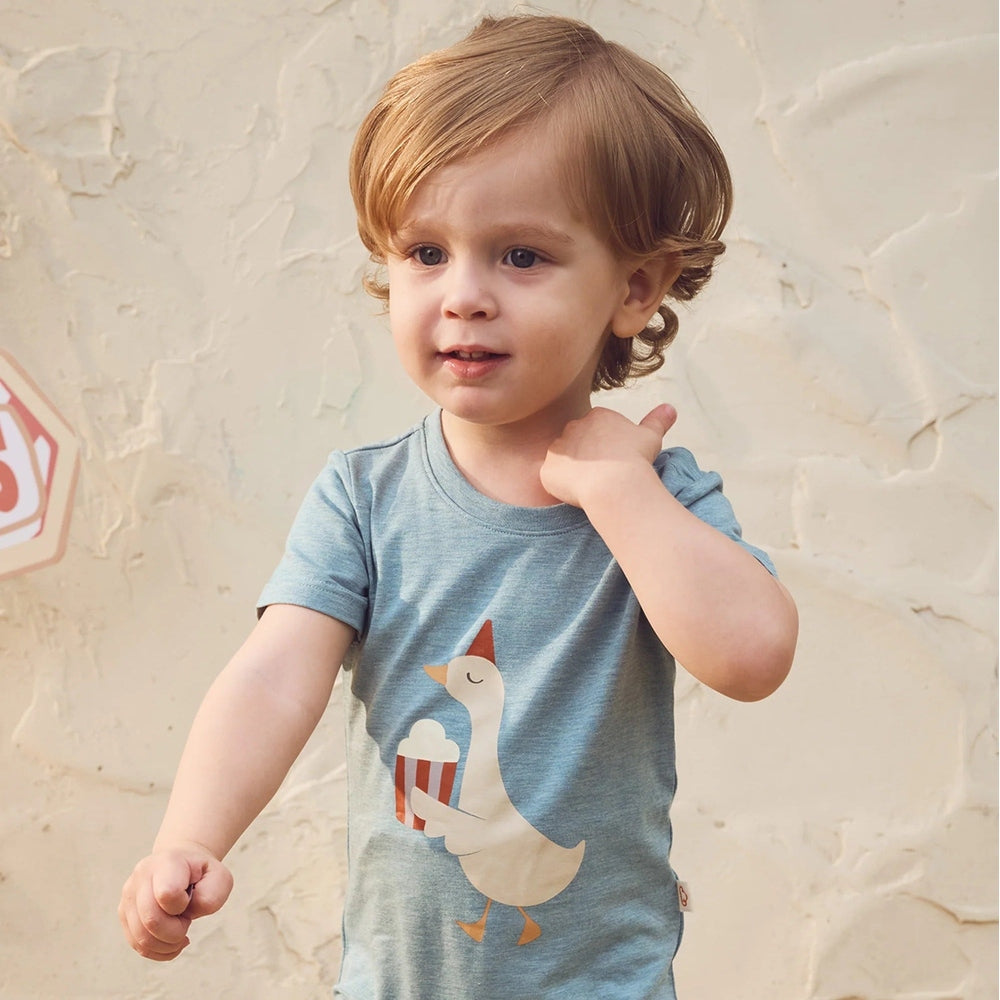 PETITE REVERY Petite Revery Onesie Meadow Green Popcorn Duck short-sleeve tee with duck applique wearing striped scarf img 2/6