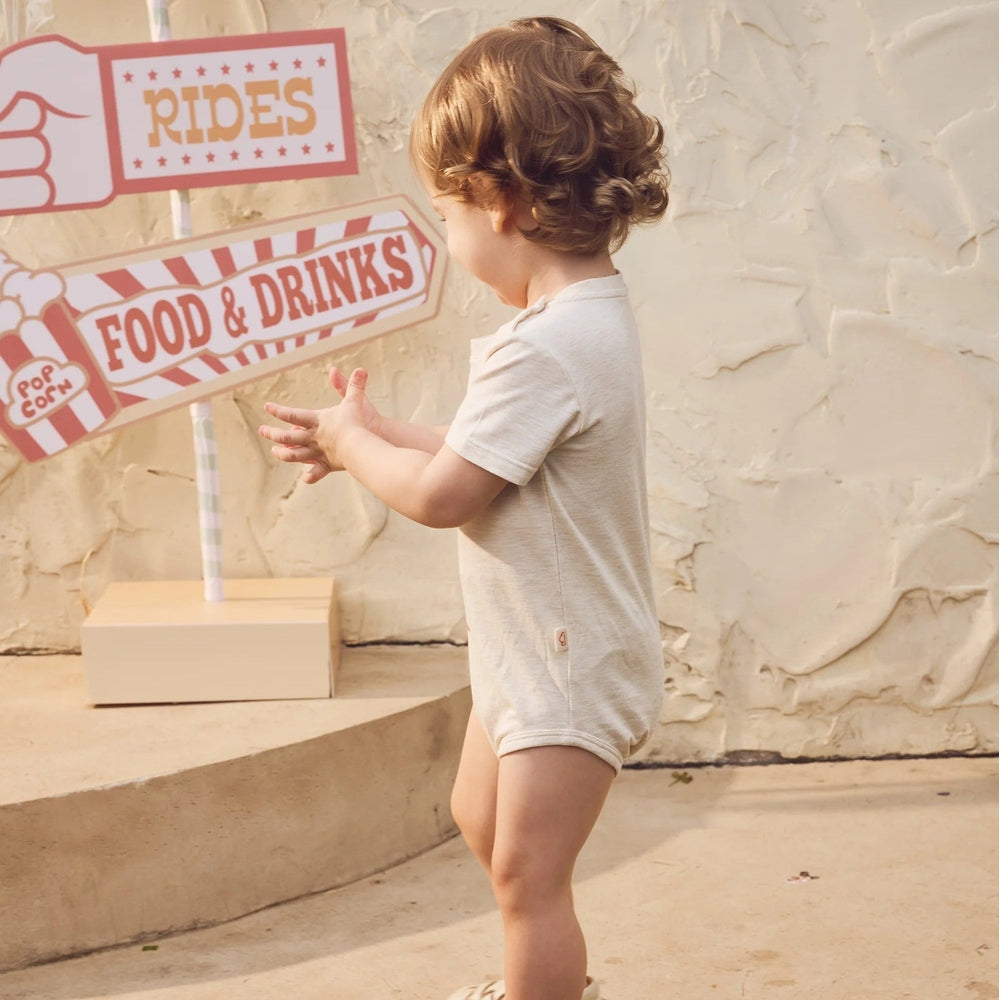 PETITE REVERY Petite Revery Onesie Nimbus Cloud Strongman short sleeves with snap closure and side pocket detail img 3/6