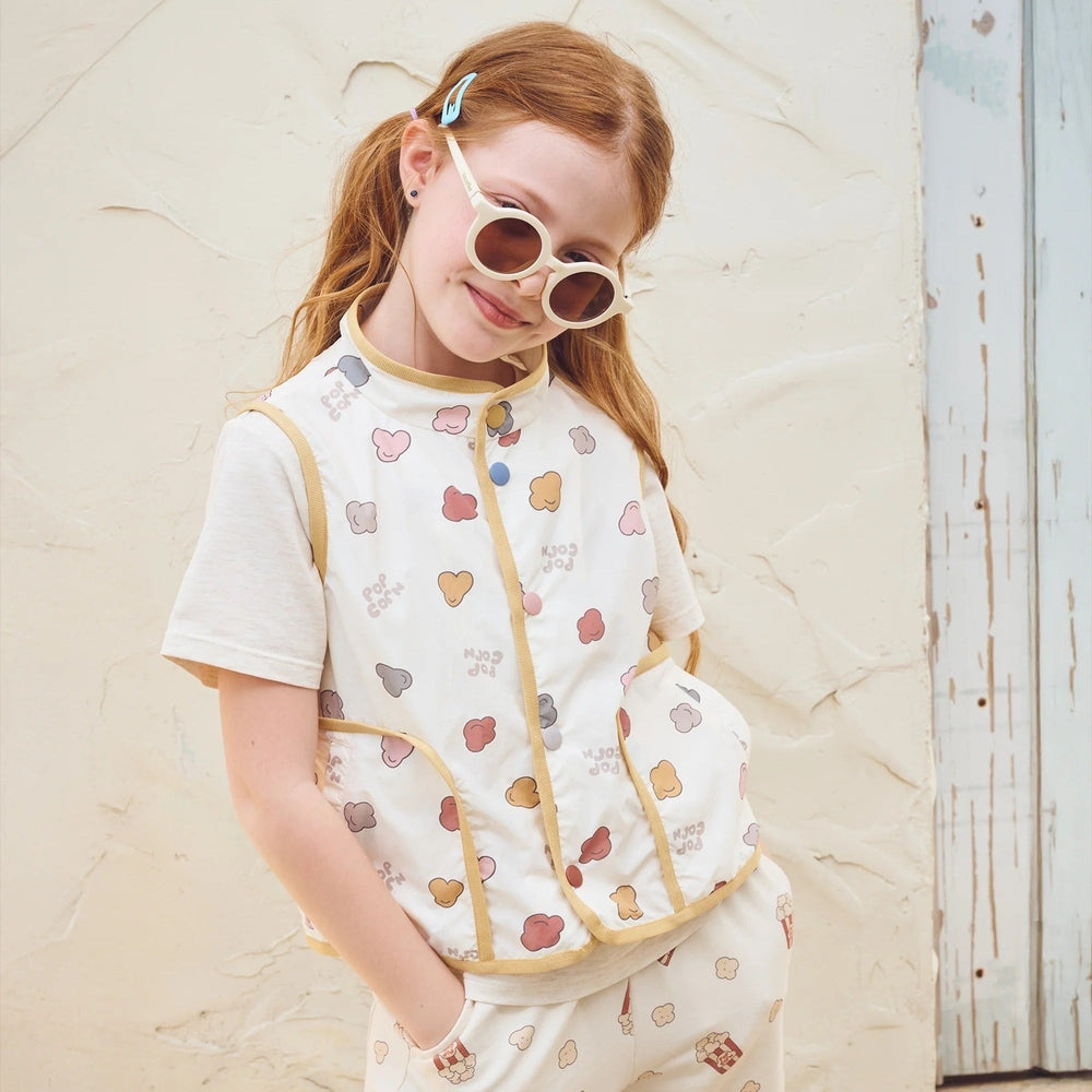 PETITE REVERY Petite Revery Recycled Nylon Vest - Popclouds with mustard trim and front pockets img 1/6