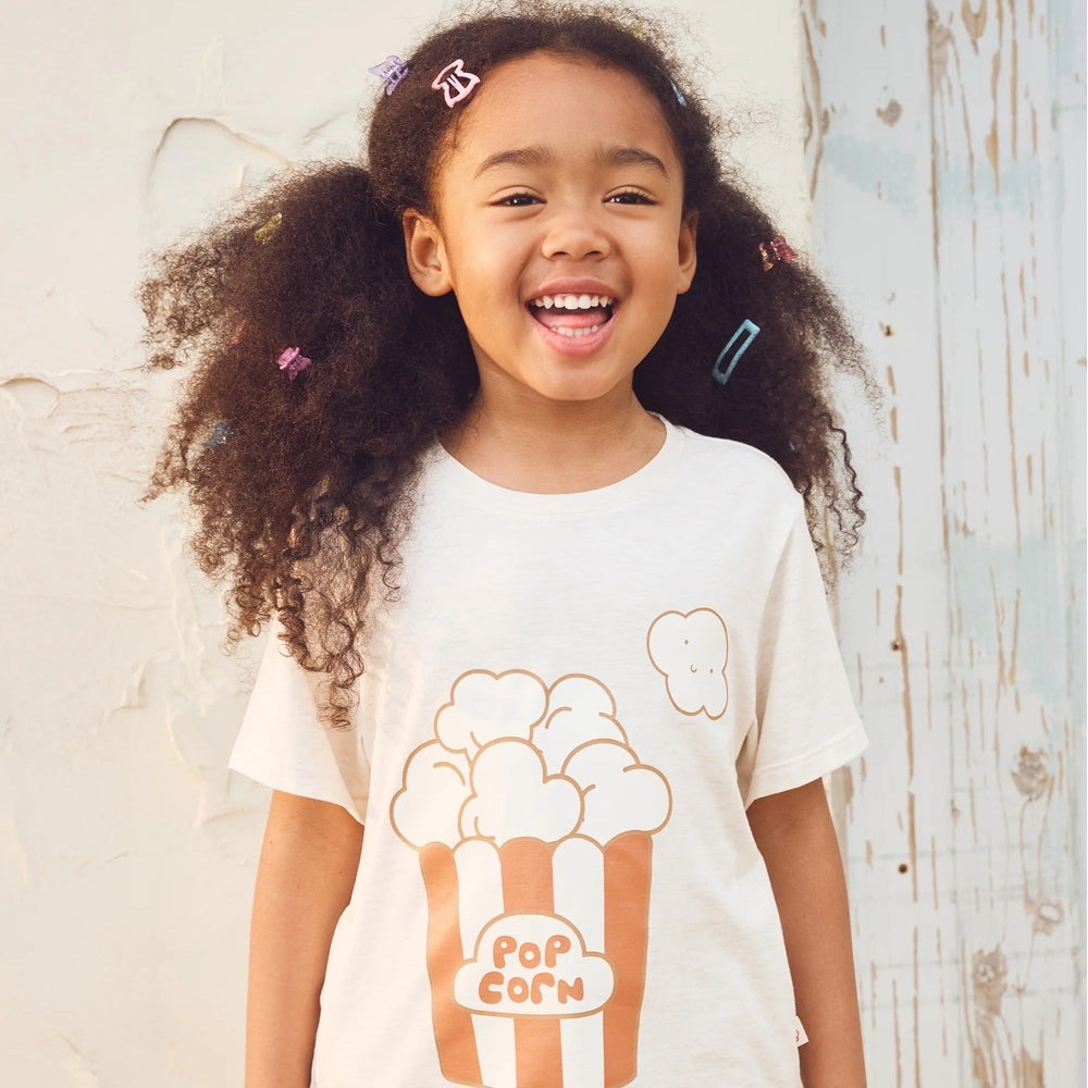 PETITE REVERY Petite Revery Short Sleeve Tee Nimbus Cloud popcorn container graphic with orange stripes and cloud img 1/6