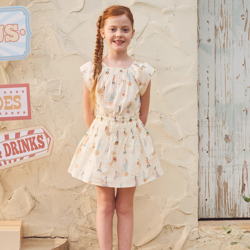 PETITE REVERY Petite Revery Skirt - Carnivale smocked elastic waist with whimsical circus animal print img 1/5